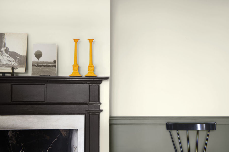 A dining room vignette with a mantle painted in Iron Mountain 2134-30.  The upper walls are painted in Titanium 2121-60.  The lower walls are panelled and painted in Desert Twilight 2137-40.